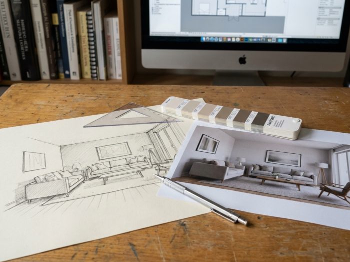 Comparaison côte à côte d'un croquis architectural dessiné à la main et d'un rendu 3D imprimé sur un bureau d'architecte